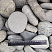 Kamenclub.ru: Галька речная окат (темно-серая) фр. 70-150 мм. купить  в Сургуте галька речная темно-серая, синяя, серая речная галька округлая  8000 руб/т   фото КАМЕНЬ КЛУБ